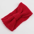 Detail of red corn kernel knit headband featuring a central knot and textured pattern - Rose Red