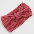 Detail of rose pink chunky knit headband featuring thick texture and twisted bow knot - Dusty Pink