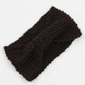 Detail of chunky knit headband with a twist knot design in chocolate brown yarn - Coffee