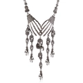 Detailed view of punk skull hands forming a heart on a multi-layer dark alloy necklace - Gun Black