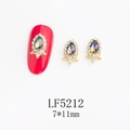 Detailed view of 7x11mm iridescent teardrop nail crystal with gold alloy base and mini rhinestones - Gold Frame AB Water Drop Style (5212)