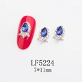 Detail of 7x11mm teardrop nail rhinestone with deep blue stone and aurora crystals - Silver Frame Blue with AB Edge Water Drop Style (5224)
