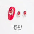 Detailed view of red teardrop nail art rhinestones in silver alloy with 7x11mm dimensions - Silver Frame Red with AB Edge Water Drop Style (5223)