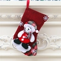 Detail of red fabric Christmas stocking with 3D teddy bear and snowflake on white fireplace - Linen Stocking [Medium] Bear