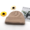 Detailed knit texture of light coffee winter beanie with decorative card and flowers - Adjustable / Khaki