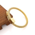 Men's gold braided steel cable bracelet with Roman numeral square decorative blocks - Square Head Bangle Gold