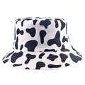 Close-up of wide-brimmed pink and white cow print bucket hat with detailed stitching - 58cm / Black