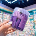 Jar of 50 seamless purple hair ties with high elasticity in varied violet shades - Approx 50 Pieces Canned / Purple
