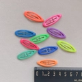 Set of 10 colorful candy-colored metal hair clips shown with measuring ruler for size - Oval Shape