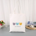 White canvas tote bag featuring three cartoon bears with Three Naughty Bears print - Three Naughty Bears