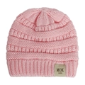 Detailed knit texture of a pink children knit beanie with a MOK KIDS patch on white background - Light Pink