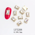 Detailed view of rectangle K9 crystal nail charm with gold alloy base and 6.5x8.5mm size - Gold Frame Transparent White Rectangle Style (5208)