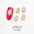 Macro view of 7x11mm golden alloy nail art charms with AB water drop crystals - Gold Frame AB Aurora Water Drop Style (5214)