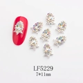 Macro detail of teardrop glass nail rhinestones with silver crown base and AB accent stones - Silver Frame Crown Transparent AB Edge Water Drop Style (5229)