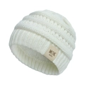 Close-up of white cable knit baby hat featuring plush fleece lining and brand label - Fleece Lined MOK / White
