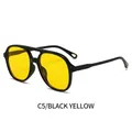 Classic pilot-style sunglasses featuring black frames and vibrant yellow lenses - Black Frame Yellow Lens