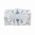 Detailed macro view of the premium white velvet texture on the baby oversized bow headband - No.4 White