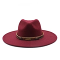Detail of burgundy fedora hat with brown leather band and metallic feather ornament - M (56-59cm) / Burgundy