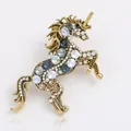 Unicorn brooch in gold alloy with multicolor crystals and shimmering rhinestones - Gold White Zirconia