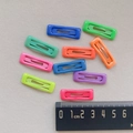 Close-up of 2cm candy-colored mini BB hair clips with scale ruler showing the small size - Rectangle Style