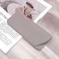 Sleek gray PU leather sunglasses pouch with fine stitching on a lifestyle background - Light Gray Flat Grain
