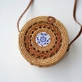 Handmade round rattan crossbody bag with blue floral ceramic and brown leather strap - Natural-Porcelain Scalloped Buckle