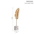 Nordic gold metal feather desk ornament with white terrazzo base in small size - Feather-Small