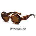 Gafas de sol ovaladas retro con montura de carey gruesa y lentes de color té en C4 - Montura a Rayas de Té Lente de Té