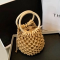 Handmade light beige woven straw tote bag with round wooden handles and drawstring inner bag - Khaki