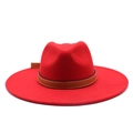 Detail of red wool felt jazz hat featuring a brown leather band with white stitching - M (56-59cm) / Red