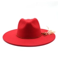Detail of red wool fedora hat featuring woven band with ethnic beads and feather accents - M (56-59cm) / Red