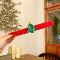 Plush Christmas slap bracelet featuring a red band and a green decorative tree - Star Christmas Tree
