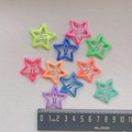 Detail of star-shaped macaron hair clips showing 3cm size with measurement ruler - Star Shape