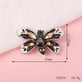 Detail of a butterfly charm with white enamel and rhinestones, size 45mm x 27mm - D1024 Butterfly Shape