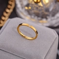 Minimalist gold plated ring featuring a single sparkling diamond-set round stone - US 5 / Gold