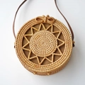 Handcrafted round rattan crossbody bag with star pattern and leather strap in natural brown - Sunflower Woven / Natural-Sunflower Bow Buckle