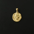 Detailed macro view of 18K gold plated coin pendant with 1973 Swiss portrait engraving - M14 Irregular Avatar