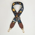 Detail of floral wide shoulder strap with ethnic patterns and gold metal swivel hooks - Black Yellow Floral + Brown Leather (Silver Hook)