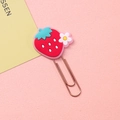 Creative strawberry shaped metal paperclip with rose gold finish on pink background - Strawberry with Flower