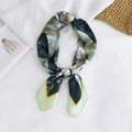 Elegant dark green silk scarf featuring white lilies and green palm leaves in a stylish knot - 22 Light Green Edge Floral