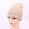 Classic knitted beanie in beige featuring a ribbed cuff for a minimalist winter style - One Size / Beige