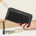 Long black zipper wallet with crocodile pattern and wrist strap for women - Black