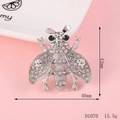 Macro detail of silver bee brooch with dimensions 42mm x 40mm and micro-inlaid crystals - D1070 Silver Bee