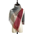 Red and grey plaid cashmere-feel scarf with classic tassels on a studio mannequin - Red Grey Plaid