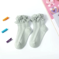 Light green cotton girl socks with lace ruffle cuff and hollow knit floral pattern - Green