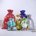 Various sizes of colorful Christmas foil drawstring gift bags with festive patterns - 6 Designs 5pcs Each (Set of 30)