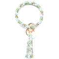Detailed view of sunflower print PU leather circle bracelet keychain with tassel and gold ring - Chrysanthemum Bull