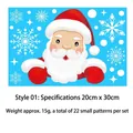 Dubbelzijdige kerstvensterstickers met de kerstman en sneeuwvlokken in rood en wit - Model 01 Kerstman
