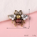 Detail of bee accessory with pearls and red stones measuring 28mm by 22mm - D1147 Wine Red Bee Small