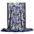 Detailed view of large navy blue and white paisley satin silk scarf on display - 90x90cm / Navy Paisley